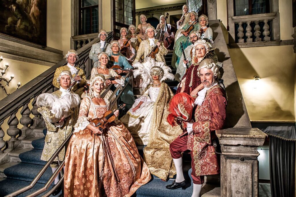 The I Musici Veneziani Orchestra on the stairs of the Scuola Grande di San Teodoro Palace